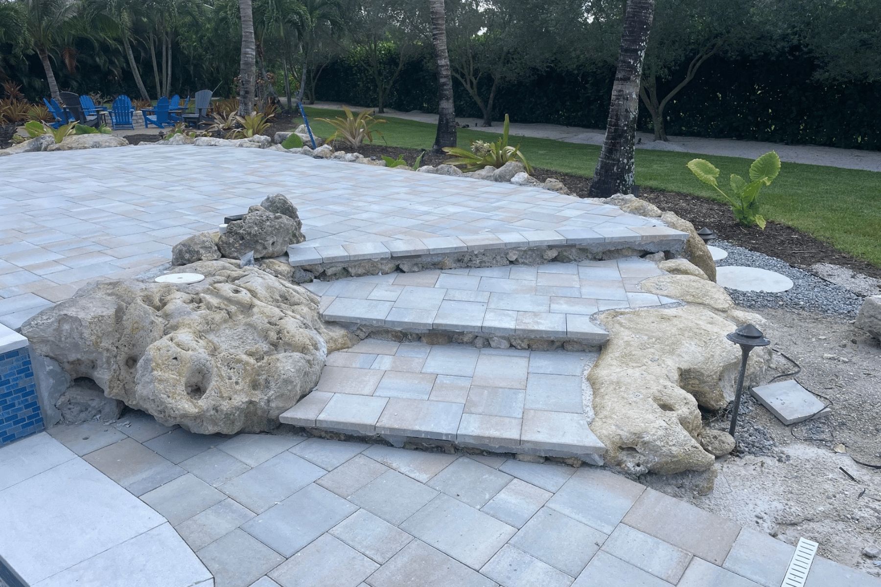 Pool Deck Surfaces Natural Stone PUP Pavers and Turf Florida