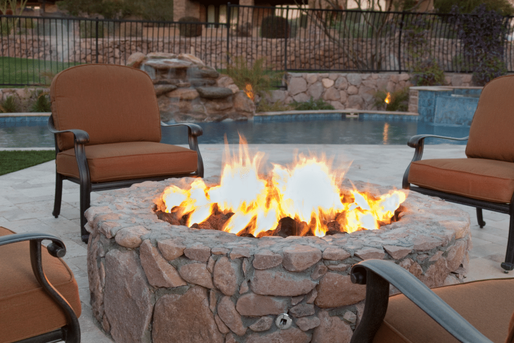 Fire Pit Paver Installation Red Brown Stone PUP Pavers and Turf Florida