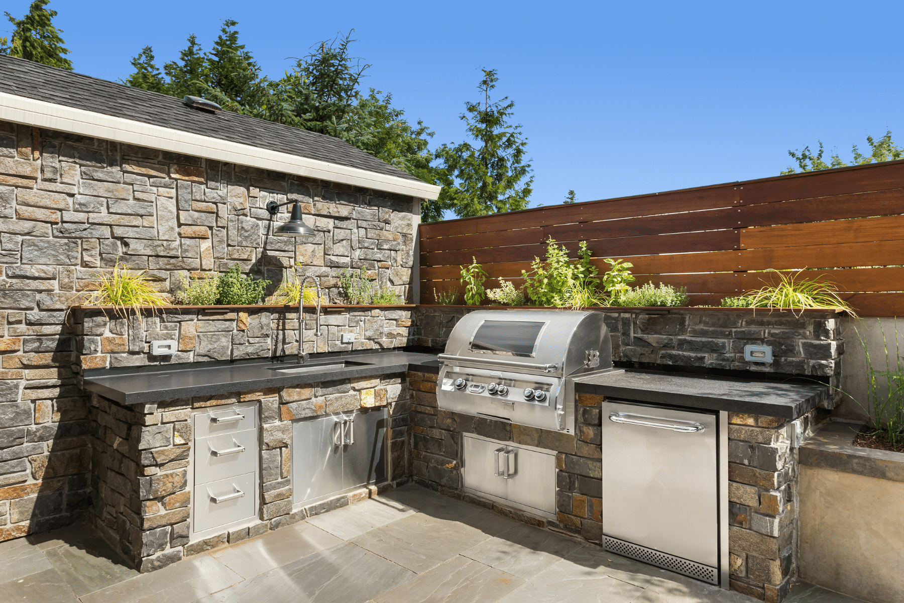 Outdoor Kitchen Paver Installation Natural Stone PUP Pavers and Turf Florida