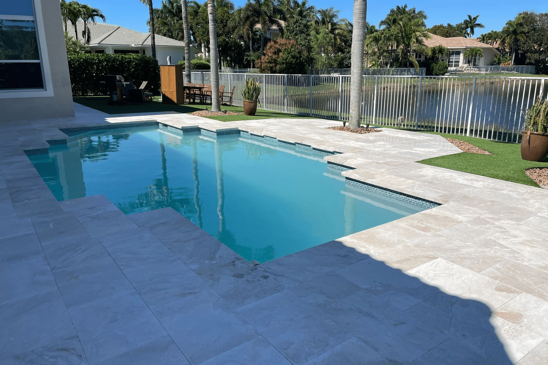 Paver Maintenance Services Pool Deck Surfaces Marble PUP Pavers and Turf Florida