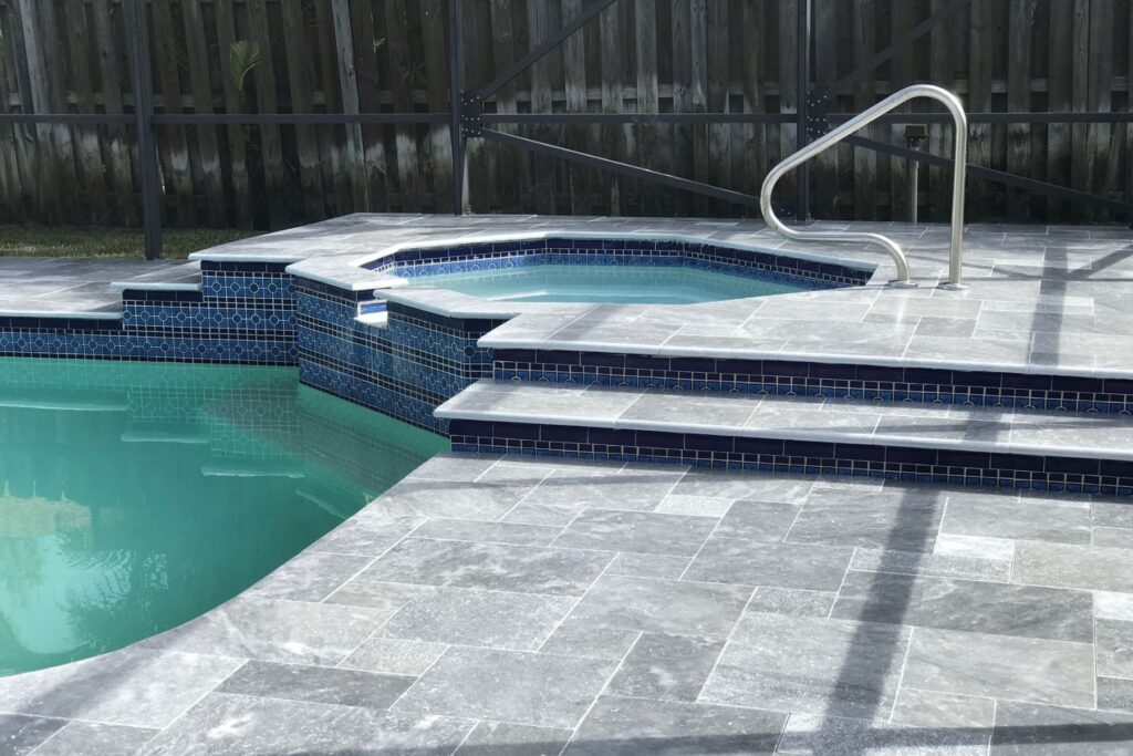 Pool Deck Surfaces Tile Stone PUP Pavers and Turf Florida