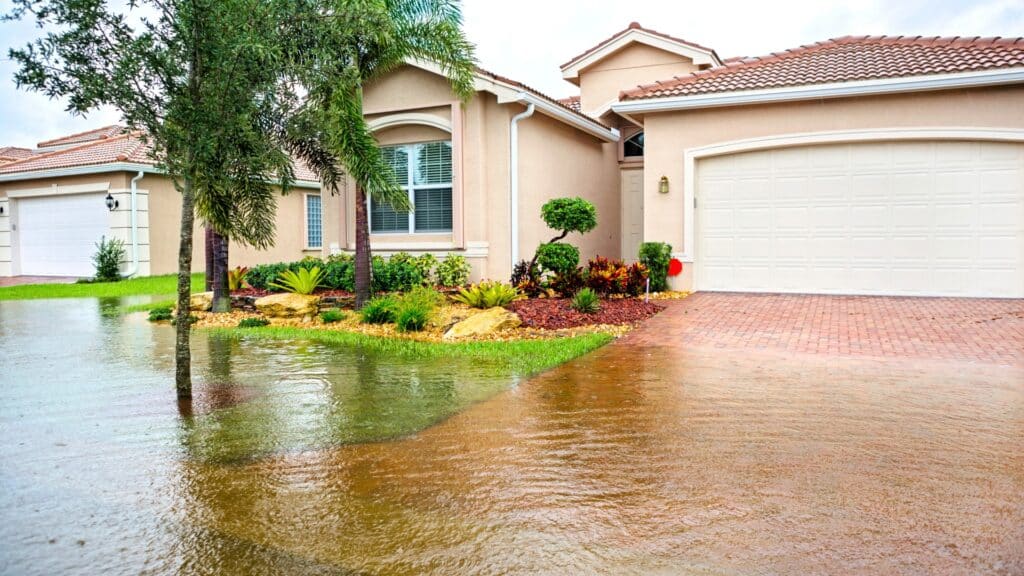 How Hurricanes Affect Paver Driveways and Pool Decks Flooding after hurricane Pup Pavers and Turf Florida